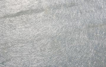 Higher Dinting laminate fibreglass or shingles?